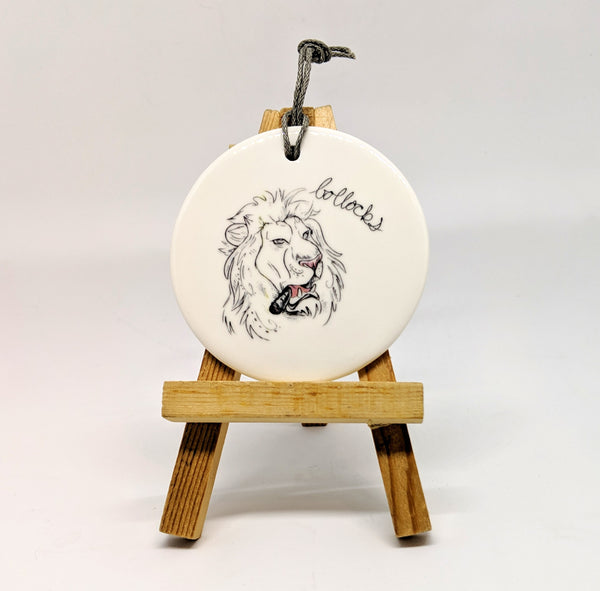 Dirty Dishes Lion Ornament